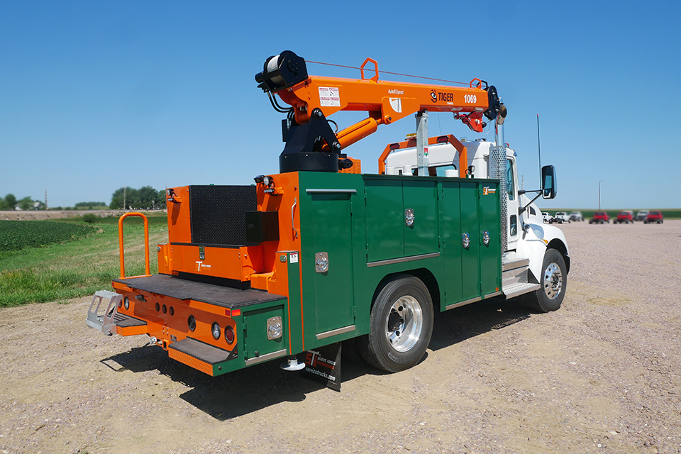 Custom made Service Trucks International crane body with a Tiger Crane